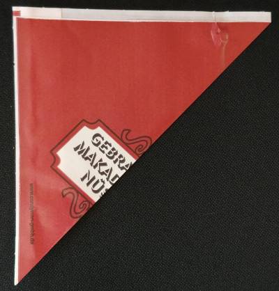 Papierspitztüte für 125 g in dunkelrot mit Aufdruck Gebrannte Makadamianüsse Restposten